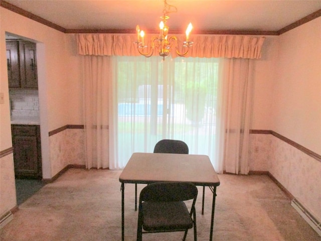 office area with carpet floors, ornamental molding, and a chandelier