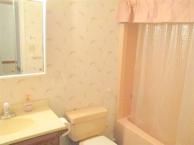 full bathroom with vanity, toilet, and shower / bathtub combination with curtain