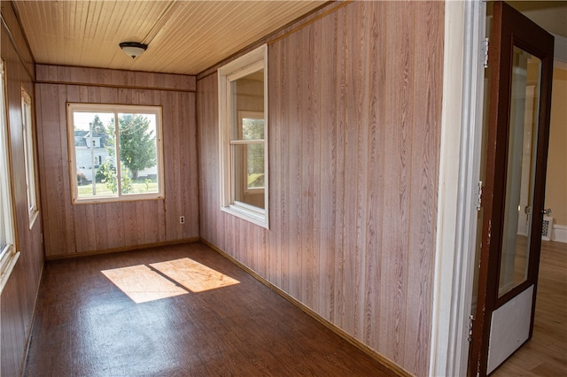 unfurnished sunroom featuring wooden ceiling