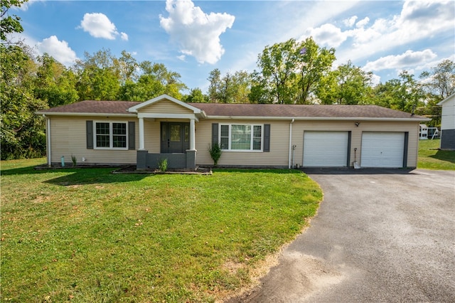 864 Main, St, PA 15458 - ranch-style home with a front yard and a garage