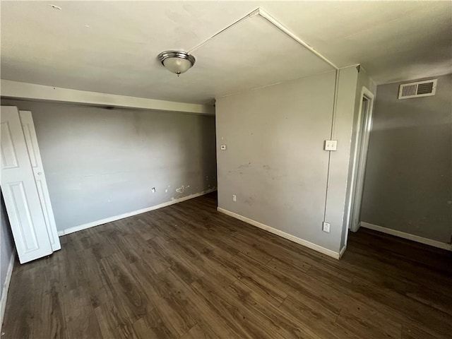 2323 Patterson Ave, Swissvale, PA 15218 - spare room featuring dark wood-type flooring and baseboards