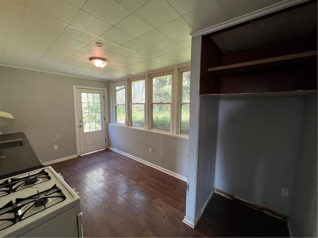 2323 Patterson Ave, Swissvale, PA 15218 - kitchen featuring baseboards, dark wood finished floors, a sink, and white range with gas cooktop