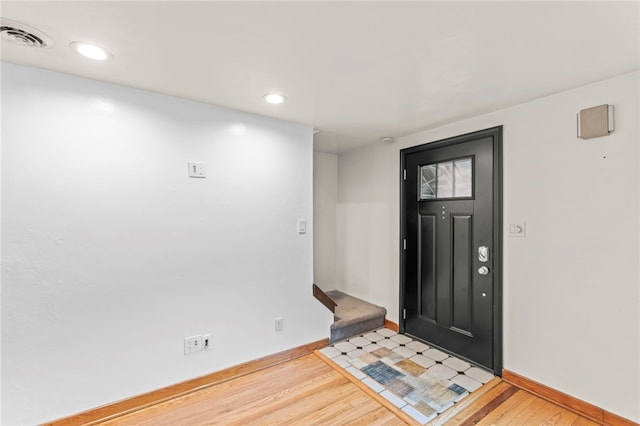 foyer entrance featuring light hardwood / wood-style flooring