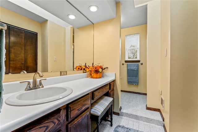 bathroom featuring vanity and tile patterned floors