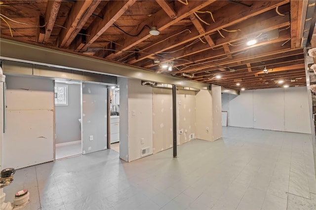 basement with washer / clothes dryer