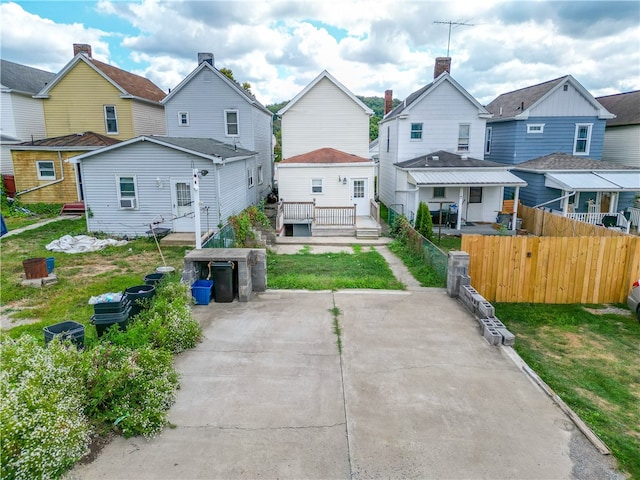 back of house with a yard