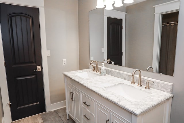 bathroom featuring tile patterned floors and vanity