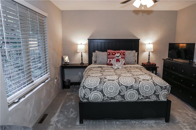 carpeted bedroom featuring ceiling fan