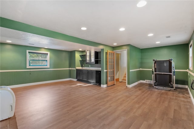 interior space featuring light hardwood / wood-style flooring and sink