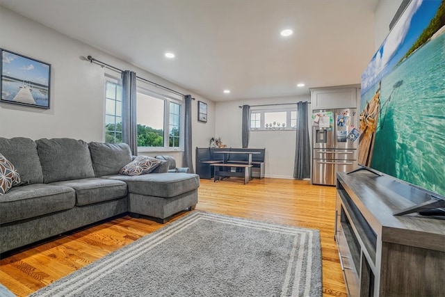 living room with light hardwood / wood-style floors