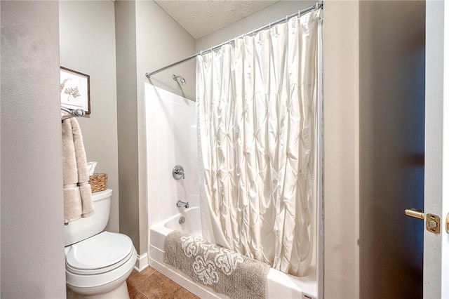 bathroom with a textured ceiling, tile patterned flooring, shower / bathtub combination with curtain, and toilet