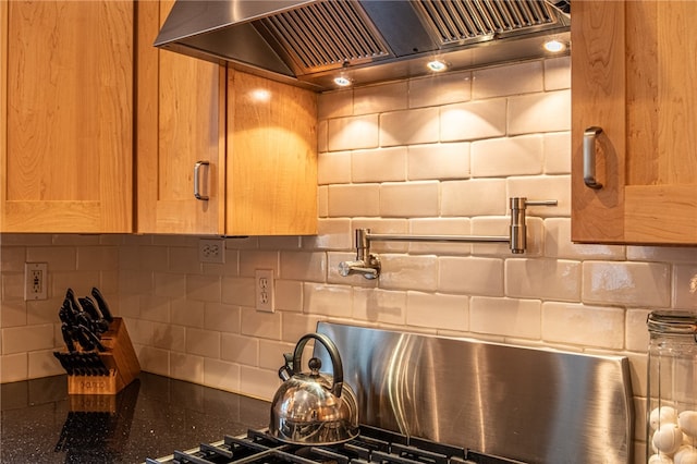 interior space with premium range hood and tasteful backsplash