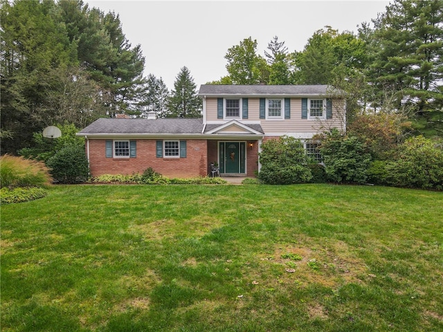 view of front of property with a front lawn