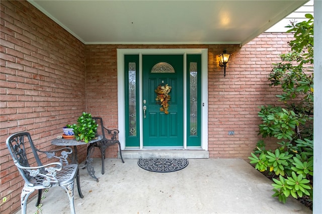 entrance to property with covered porch