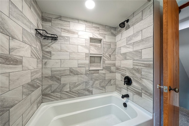 bathroom featuring tiled shower / bath combo