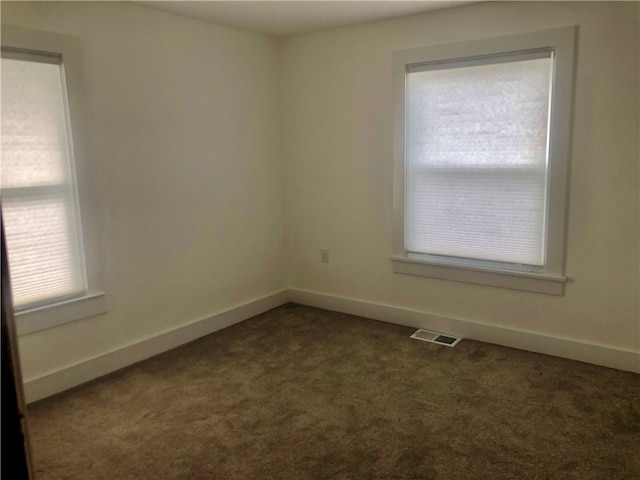 view of carpeted spare room