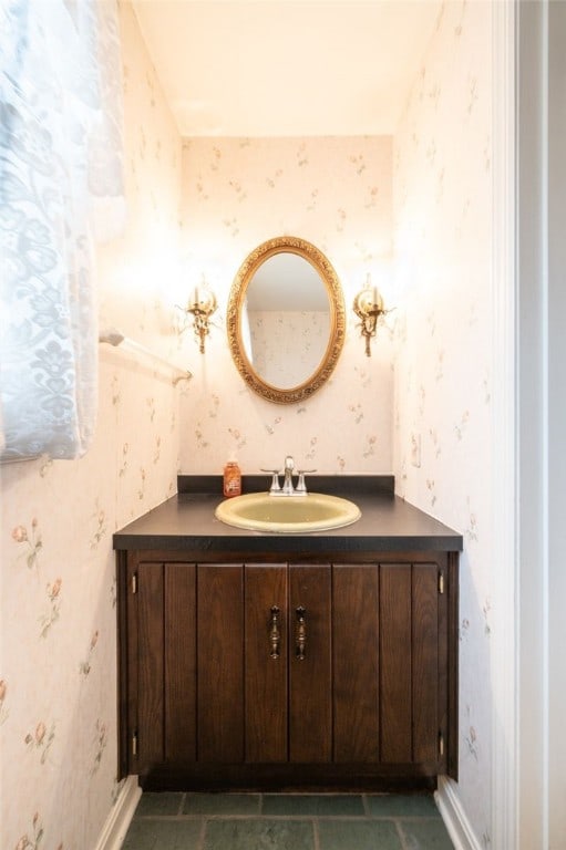 bathroom with vanity and tile patterned floors