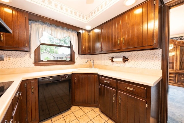 kitchen with black dishwasher, tasteful backsplash, light tile patterned flooring, sink, and ornamental molding