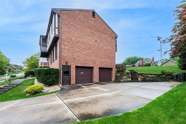 view of side of home featuring a garage