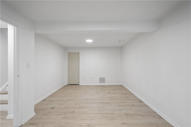 unfurnished room featuring light hardwood / wood-style flooring