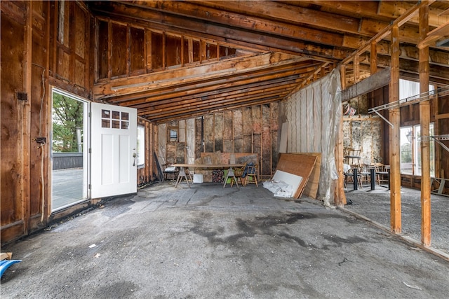 misc room featuring lofted ceiling and a wealth of natural light