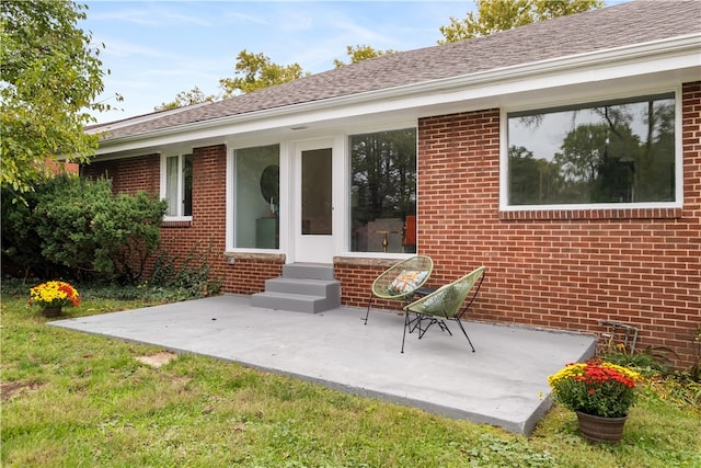 exterior space featuring a patio and a yard