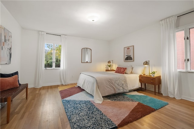 bedroom featuring hardwood / wood-style flooring