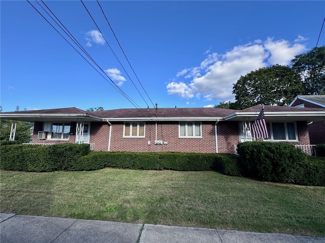 view of front of property with a front lawn