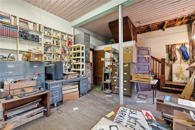 interior space featuring wood walls and hardwood / wood-style floors