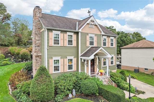 view of front of house featuring central AC unit