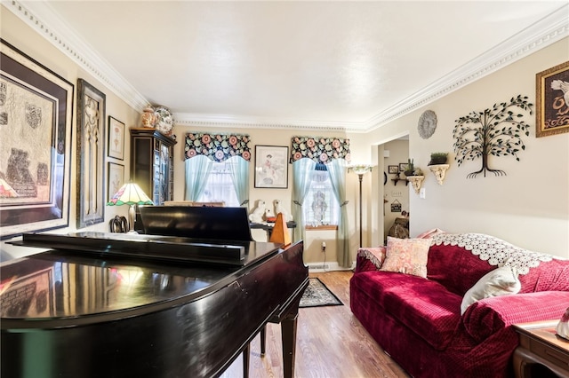 interior space featuring ornamental molding and hardwood / wood-style flooring