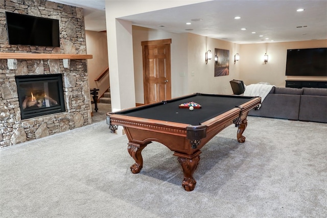 rec room with a stone fireplace, carpet floors, and billiards