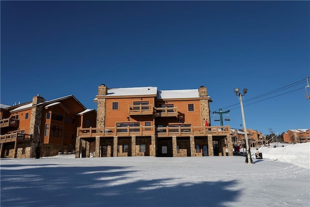 view of snow covered property