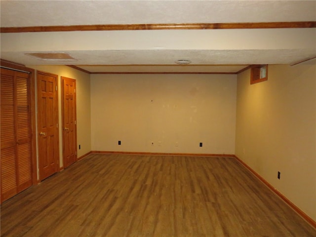 basement with wood-type flooring