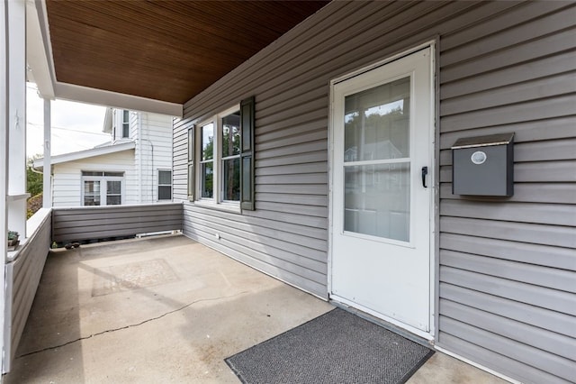 entrance to property with covered porch