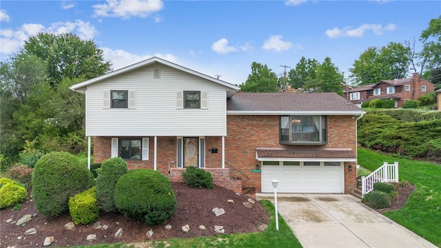 split level home with a garage