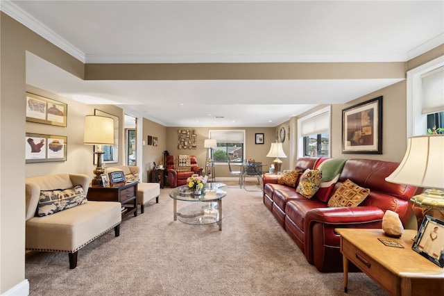 living room with ornamental molding and carpet floors