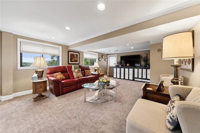 living room with ornamental molding, a wealth of natural light, and carpet flooring