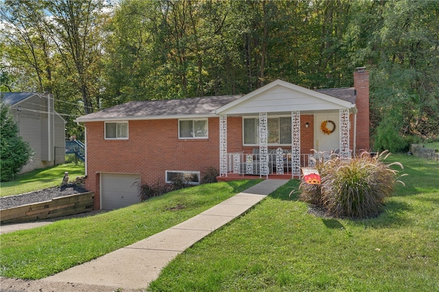 view of front facade featuring a porch, a garage, and a front lawn