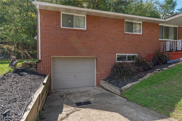 view of side of home with a garage