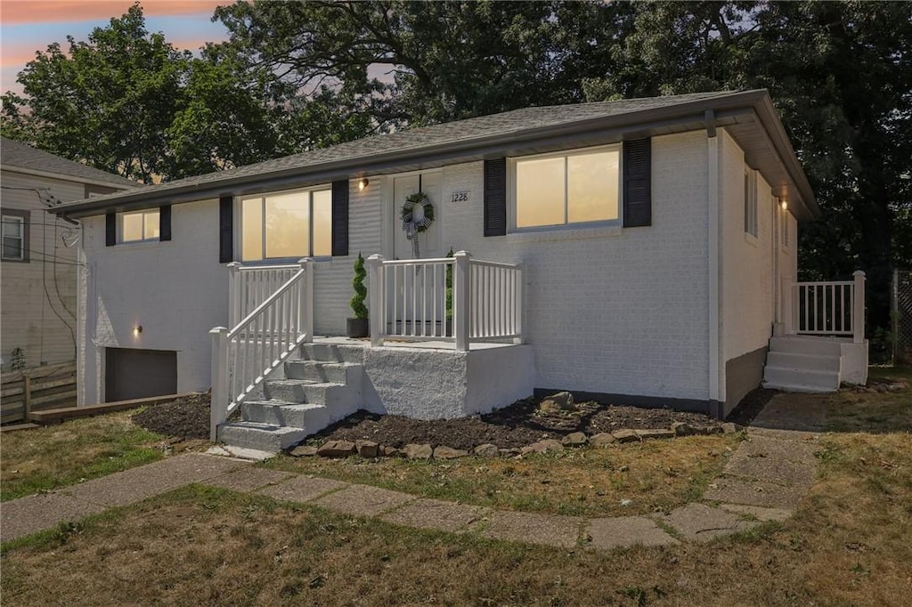 view of front of home with brick siding