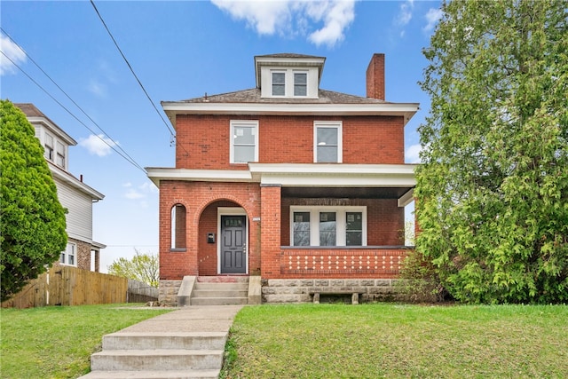 view of front facade with a front yard