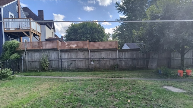 view of yard with a deck