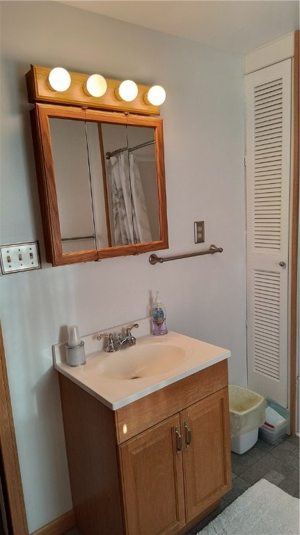 bathroom with vanity and tile patterned floors