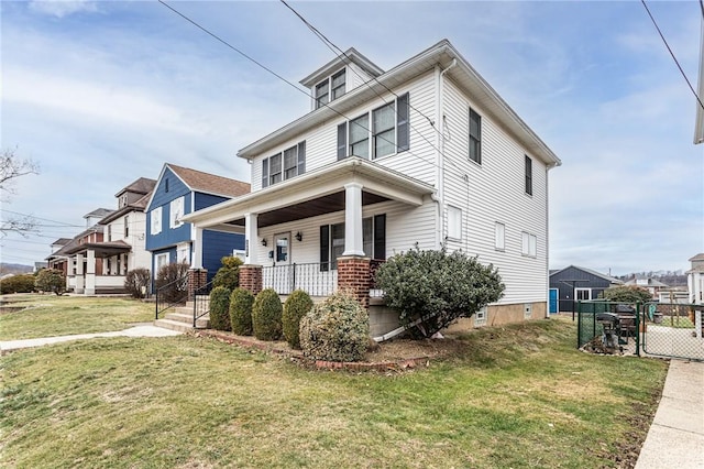 view of front of home with a front lawn and a porch