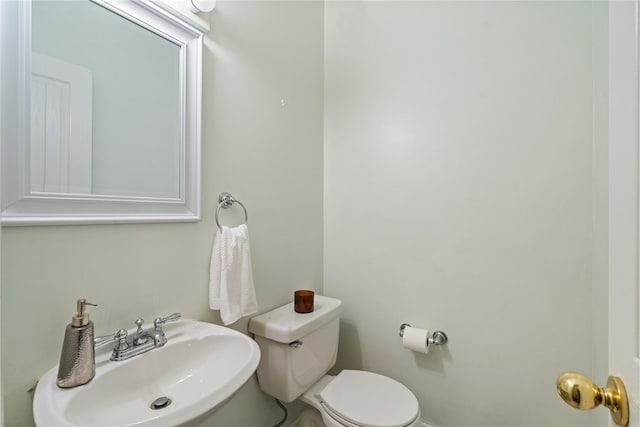 bathroom with toilet and sink