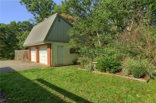 garage with a lawn