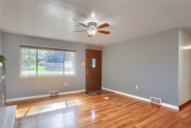 entryway with light hardwood / wood-style floors and ceiling fan