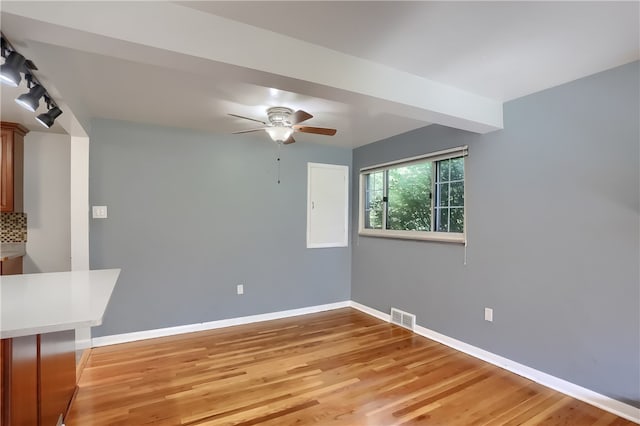 interior space featuring ceiling fan and light hardwood / wood-style floors