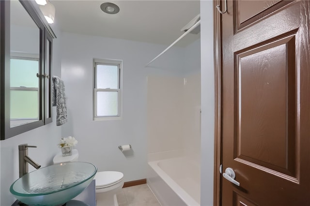 full bathroom with tile patterned floors, toilet, sink, and bathing tub / shower combination